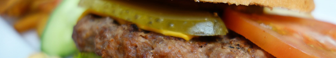 Eating American (Traditional) Burger Sandwich at Riverside North restaurant in Charlottesville, VA.
